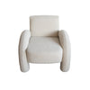 Elevated front perspective focusing on the thick cushioning and rounded edges