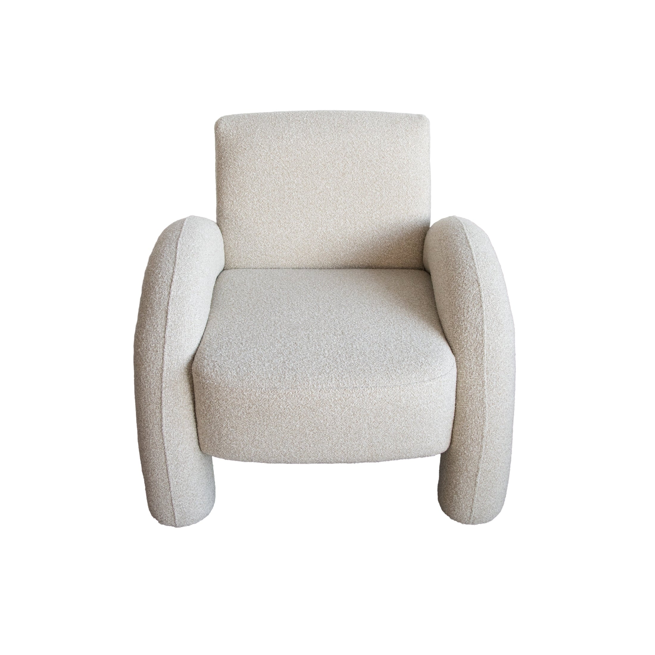 Front view of the Alva Accent Chair in cream bouclé with distinctive oversized tubular legs and a sculptural silhouette