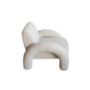 Rear angled view highlighting the uniform bouclé finish and the structural integrity of the back legs