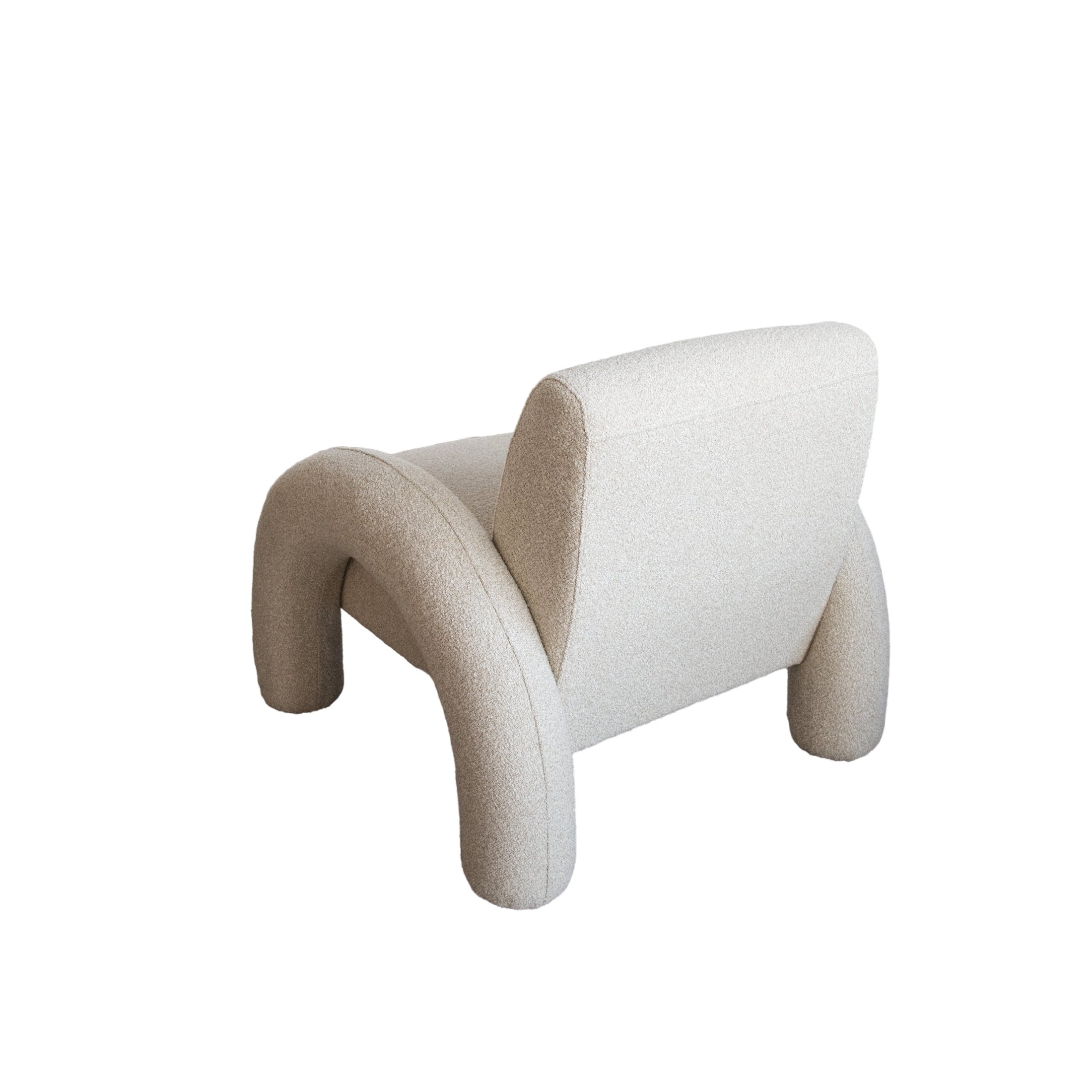 Front view of the Alva Accent Chair in cream bouclé with distinctive oversized tubular legs and a sculptural silhouette