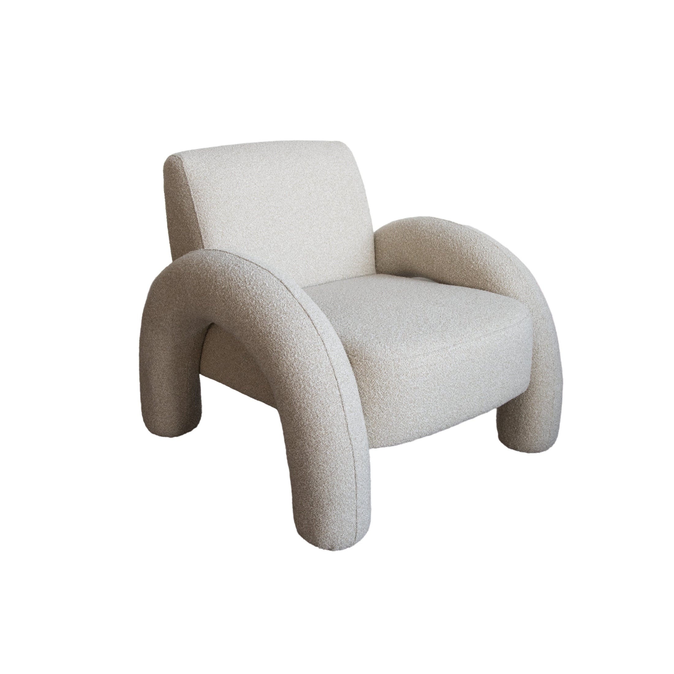 Front view of the Alva Accent Chair in cream bouclé with distinctive oversized tubular legs and a sculptural silhouette