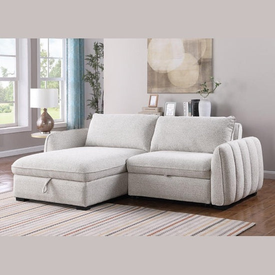 Front view of the Amira Pullout Sleeper Sectional in light grey textured fabric with a right-facing chaise.