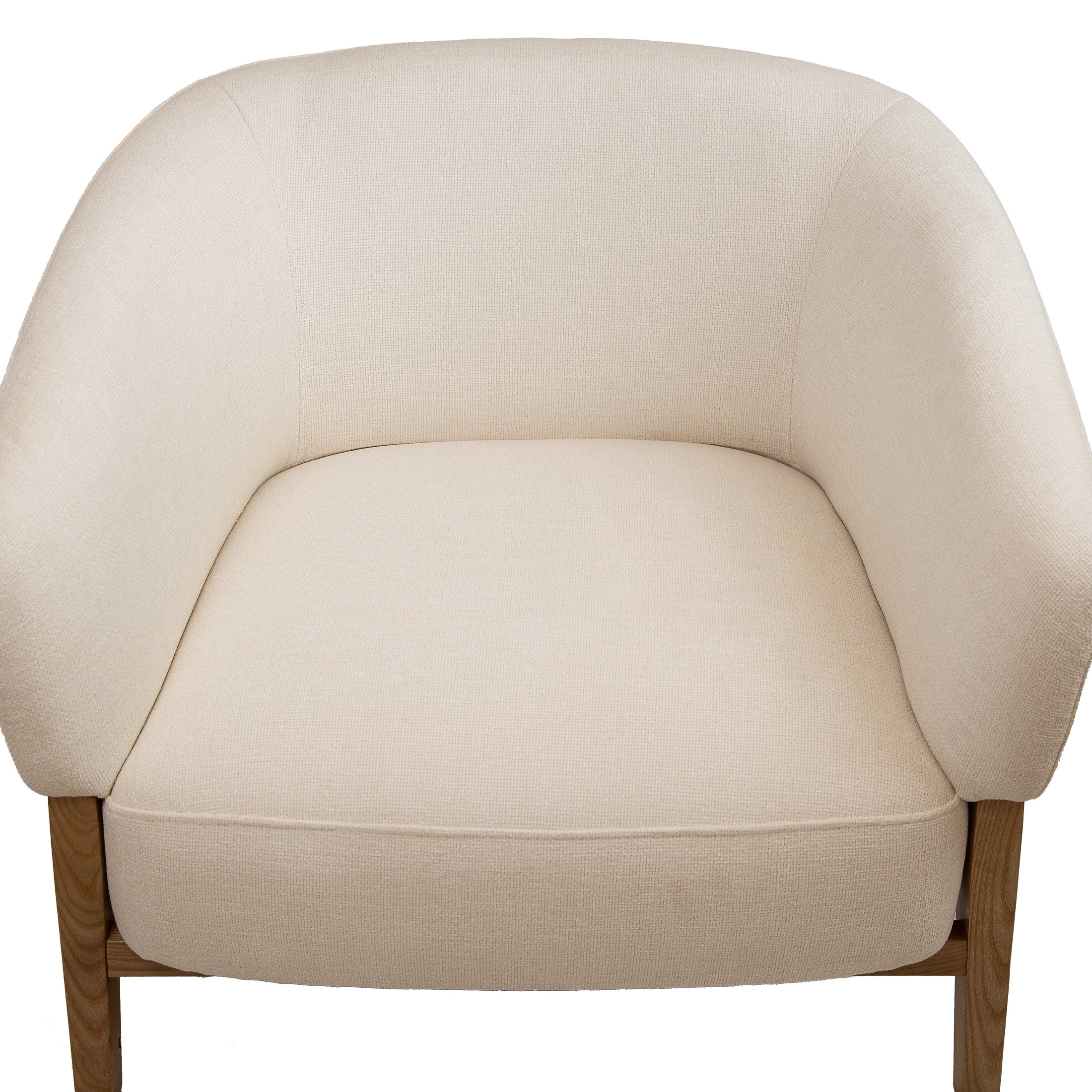 Front view of the Annika Accent Chair in Joyce Ivory textured fabric with a tapered oak wood base.