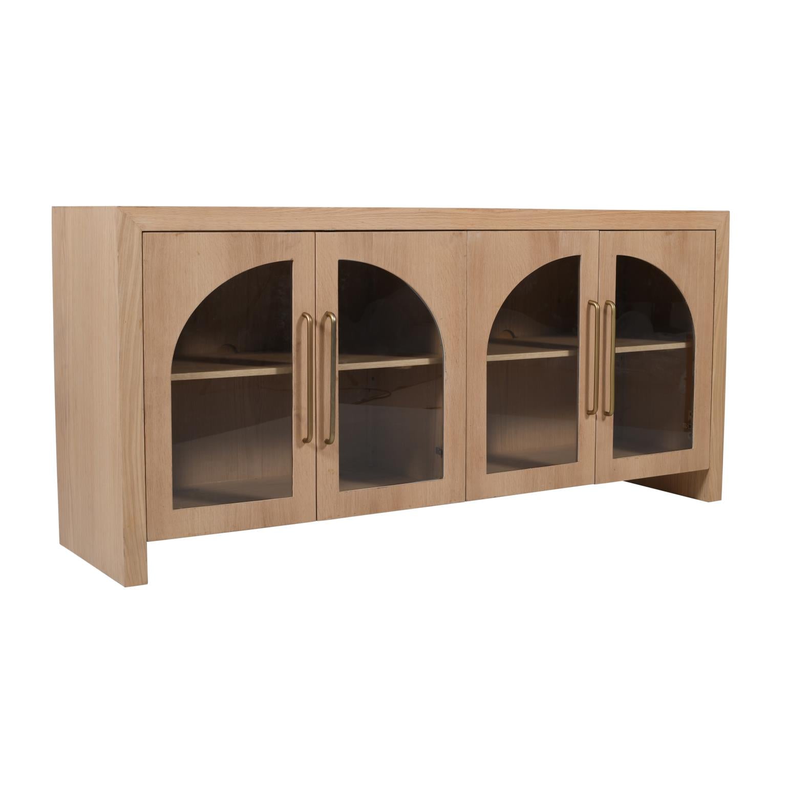 Three-quarter perspective view of the Archimedes 60-inch console featuring natural oak wood construction, four arched glass doors, and elegant long gold handles