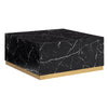 Perspective shot highlighting the seamless marble-look edges and the reflective gold base of the square coffee table