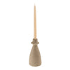 Front view of the Arta terracotta candle holder featuring a conical base and textured sandstone finish with a cream taper candle
