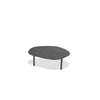 Perspective view highlighting the slim profile of the charcoal slate tabletop and the simple cylindrical leg design