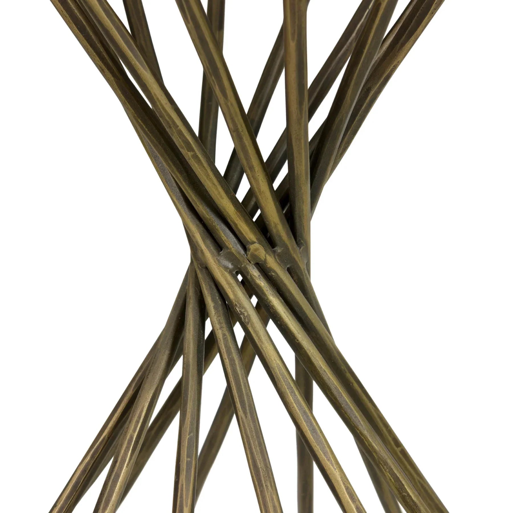 Close-up shot focusing on the intersection of the slender gold metal rods that form the sculptural hourglass pedestal