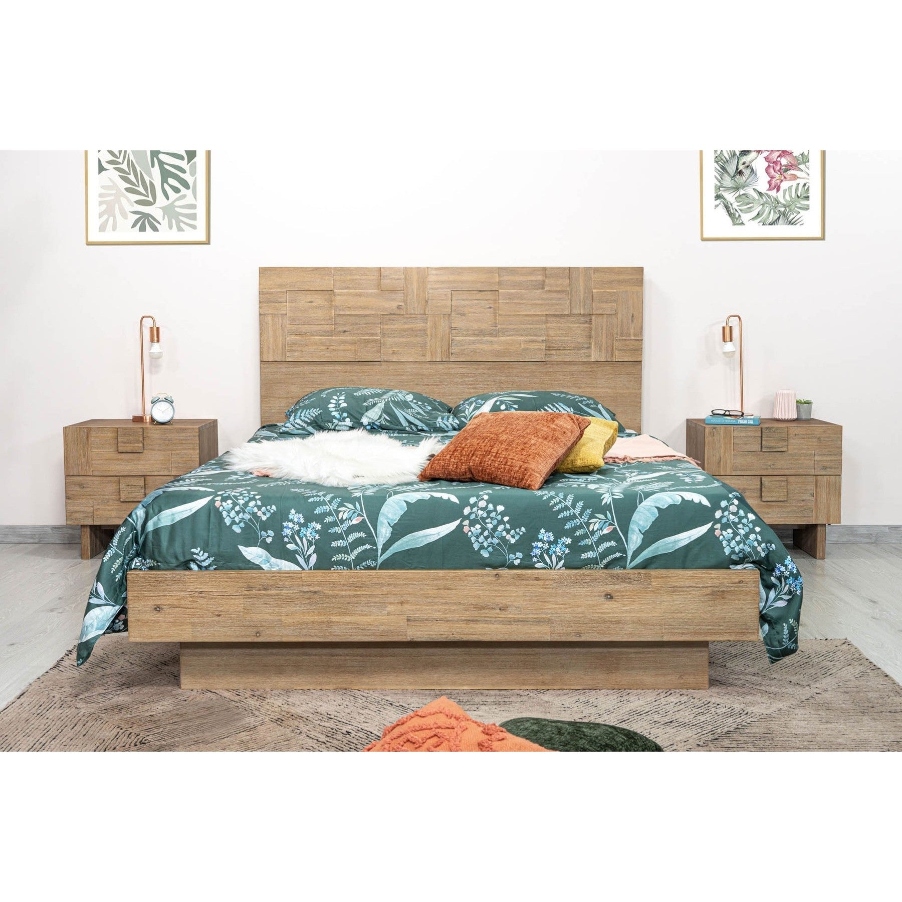 Front view of the Atlantis platform bed featuring a tall headboard with a unique patchwork wood inlay and light driftwood finish
