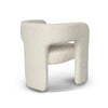 Angled side view of Bamse accent chair in light fabric