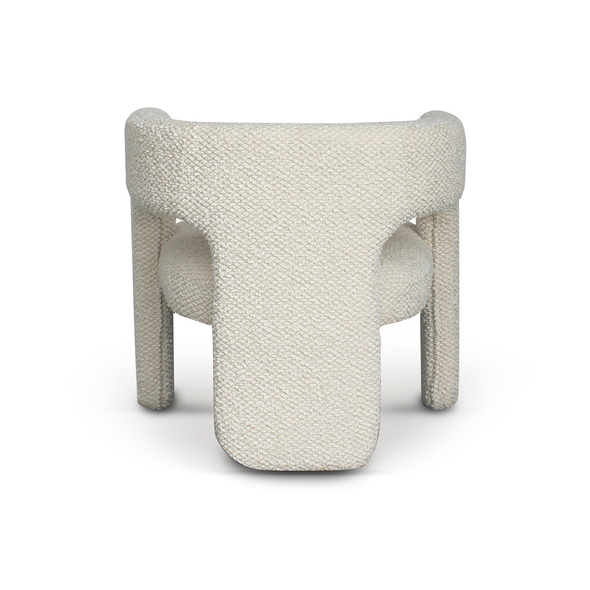 Rear angled view of Bamse accent chair in light fabric