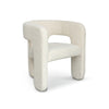 Angled view of Bamse accent chair in light fabric