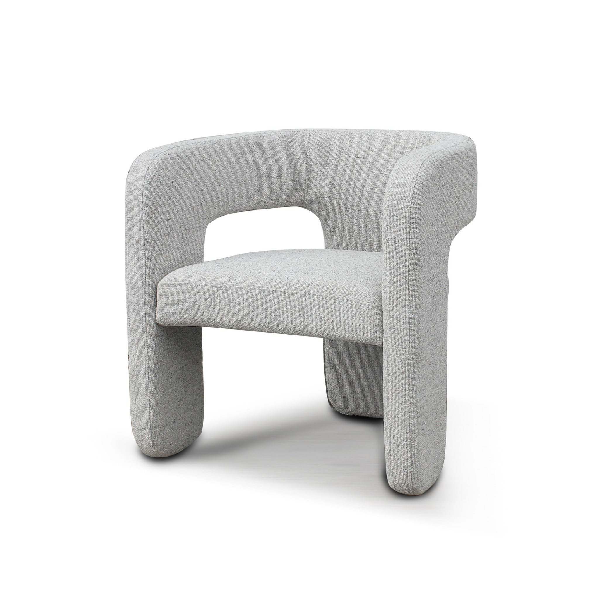 Angled view of Bamse accent chair in grey fabric