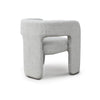 Rear angled view of Bamse accent chair in grey upholstery