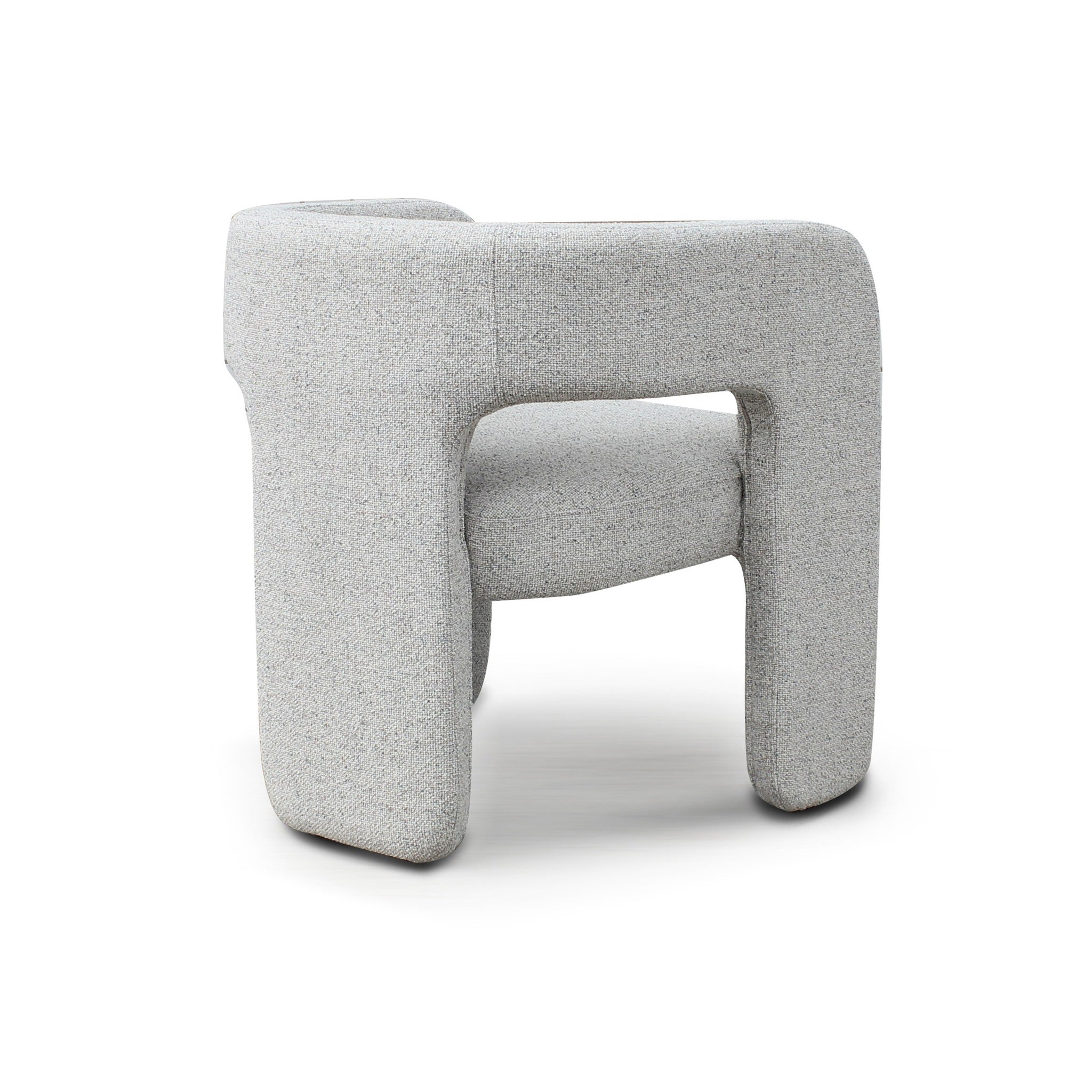 Rear angled view of Bamse accent chair in grey upholstery