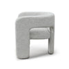 Side view of Bamse accent chair in grey upholstery