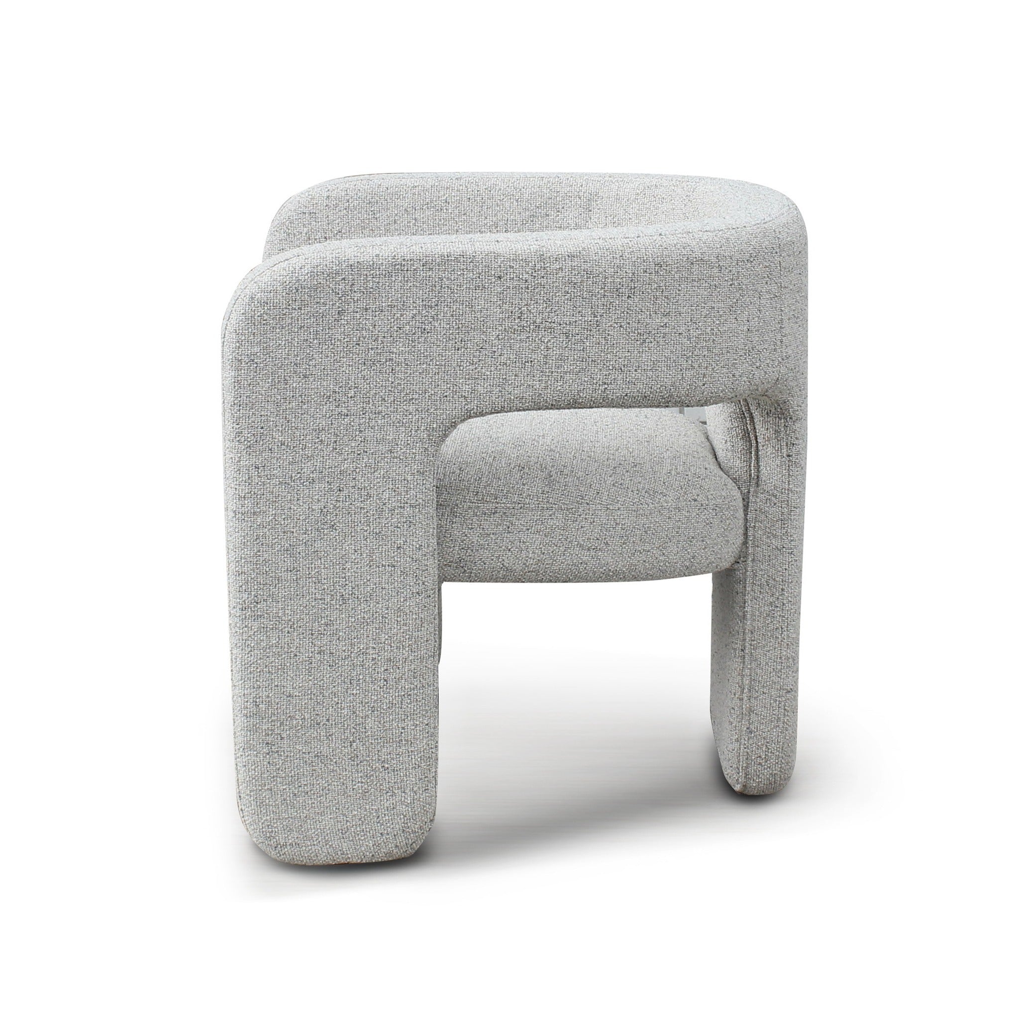 Side view of Bamse accent chair in grey upholstery