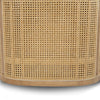 Close-up of the connection between the solid oak frame and the natural cane inlay at the back of the chair.