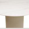 Close-up shot focusing on the tactile vertical fluting and matte beige finish of the sturdy cylindrical pedestal support
