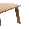 Straight-on side profile view emphasizing the balanced proportions and clean silhouette of the walnut table
