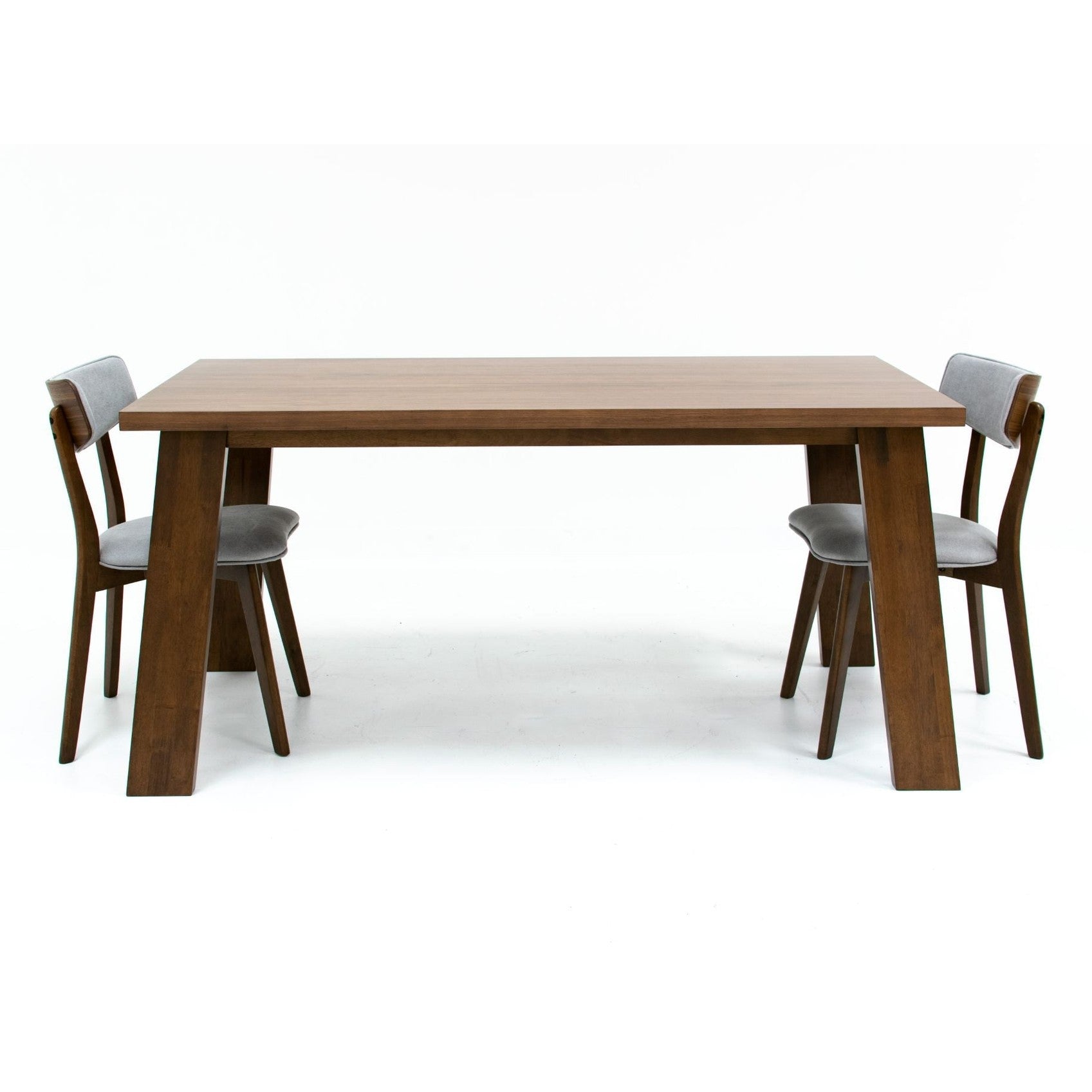 Studio lifestyle shot featuring the walnut Bessa table paired with two black upholstered contemporary chairs
