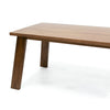 Close-up shot focusing on the high-quality wood joinery where the tabletop meets the tapered block leg