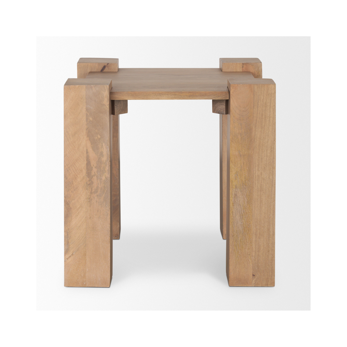 Straight-on front view highlighting the architectural silhouette and the symmetrical post leg design of the light brown oak table