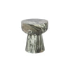 Side perspective view emphasizing the seamless curved transition between the round tabletop and the wide conical base
