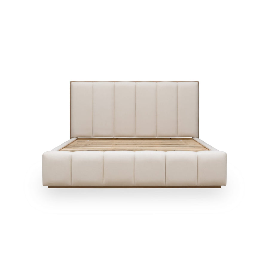 Front view of the Bjorn upholstered platform bed featuring vertical channel tufting in cotton fabric with a natural chai wood base