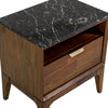 Macro top-down detail shot showcasing the unique white veining and polished finish of the black marble top