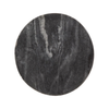 Direct overhead view highlighting the rich grey and white mineral veining of the circular black marble tabletop
