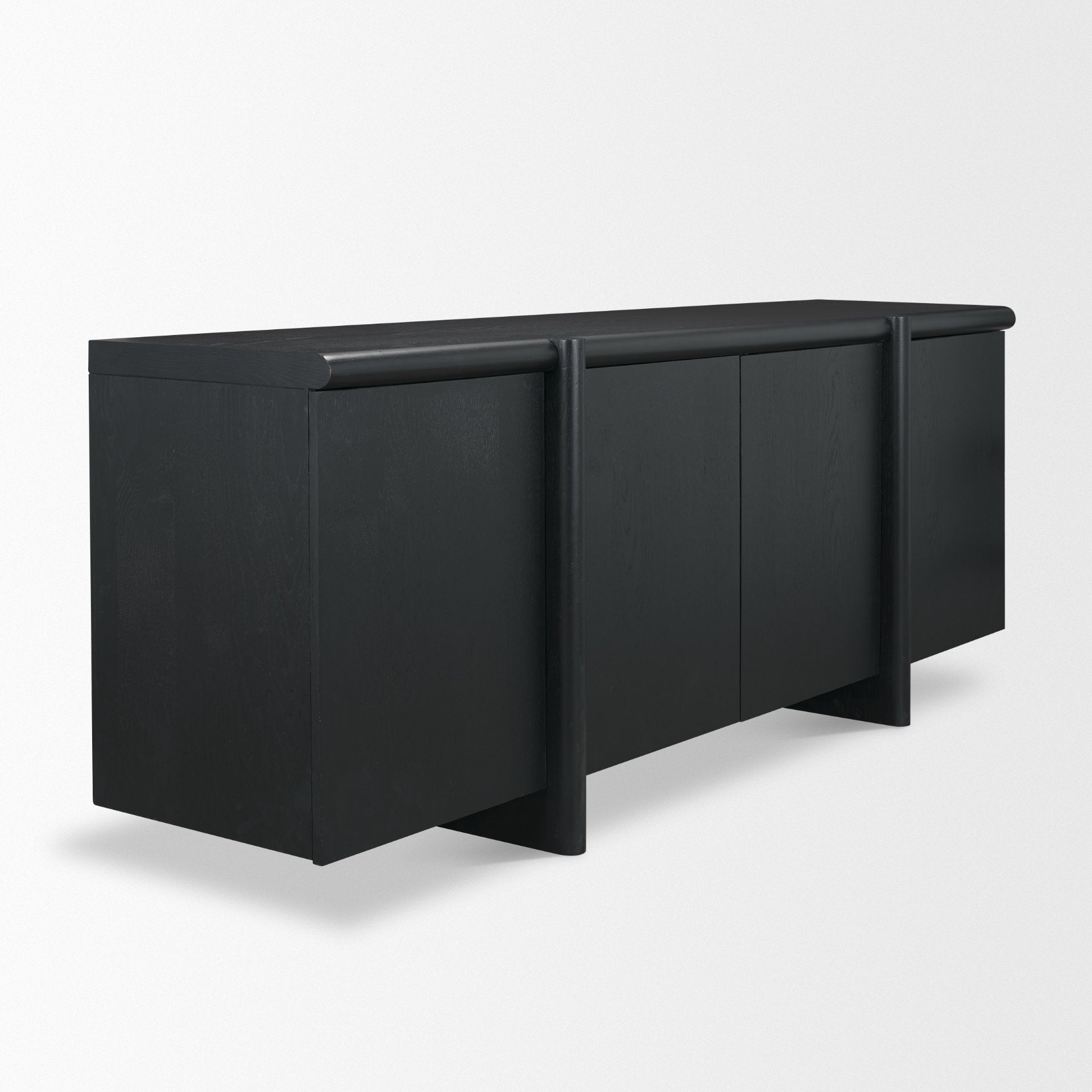 Three-quarter perspective view of the Rowan sideboard in a black oak finish highlighting the unique architectural wrap-around leg design