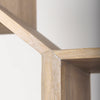 Close-up shot focusing on the high-quality mitered joints and seamless construction of the geometric shelving compartments