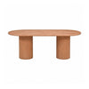 Front view of the 84 inch Breck oval dining table in natural oak featuring two substantial ribbed pedestal bases