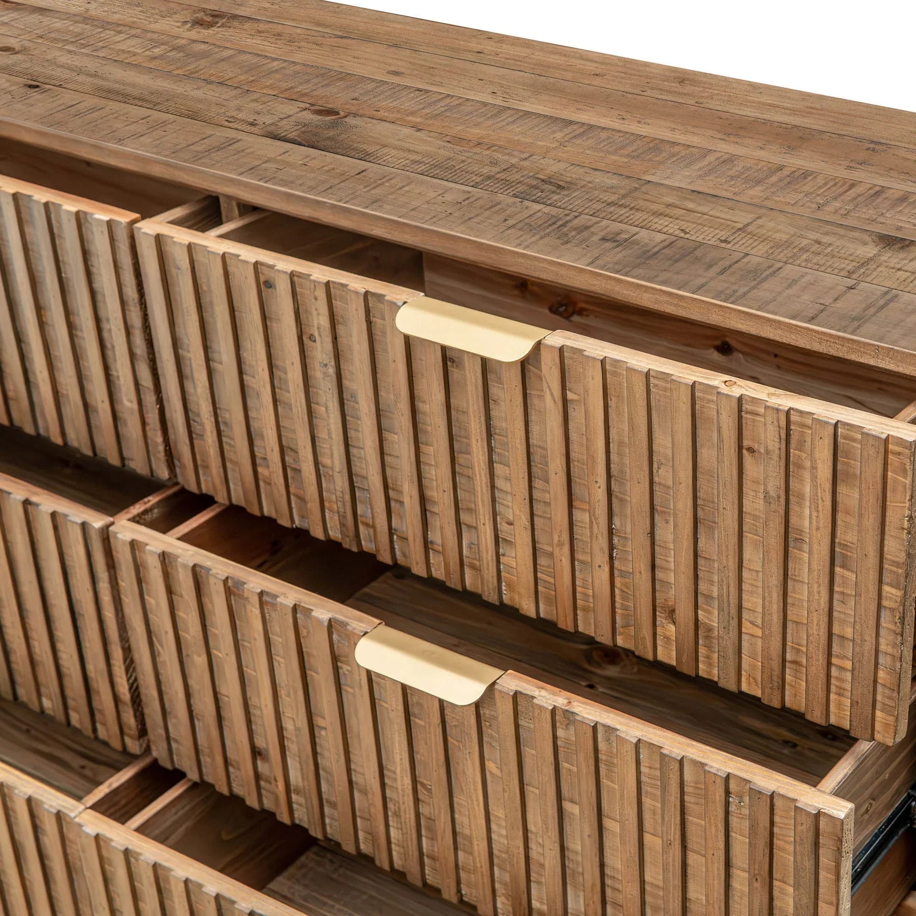 Front view of the Britanica double dresser featuring a warm reclaimed wood finish, vertical fluted drawer fronts, and sleek horizontal gold handles