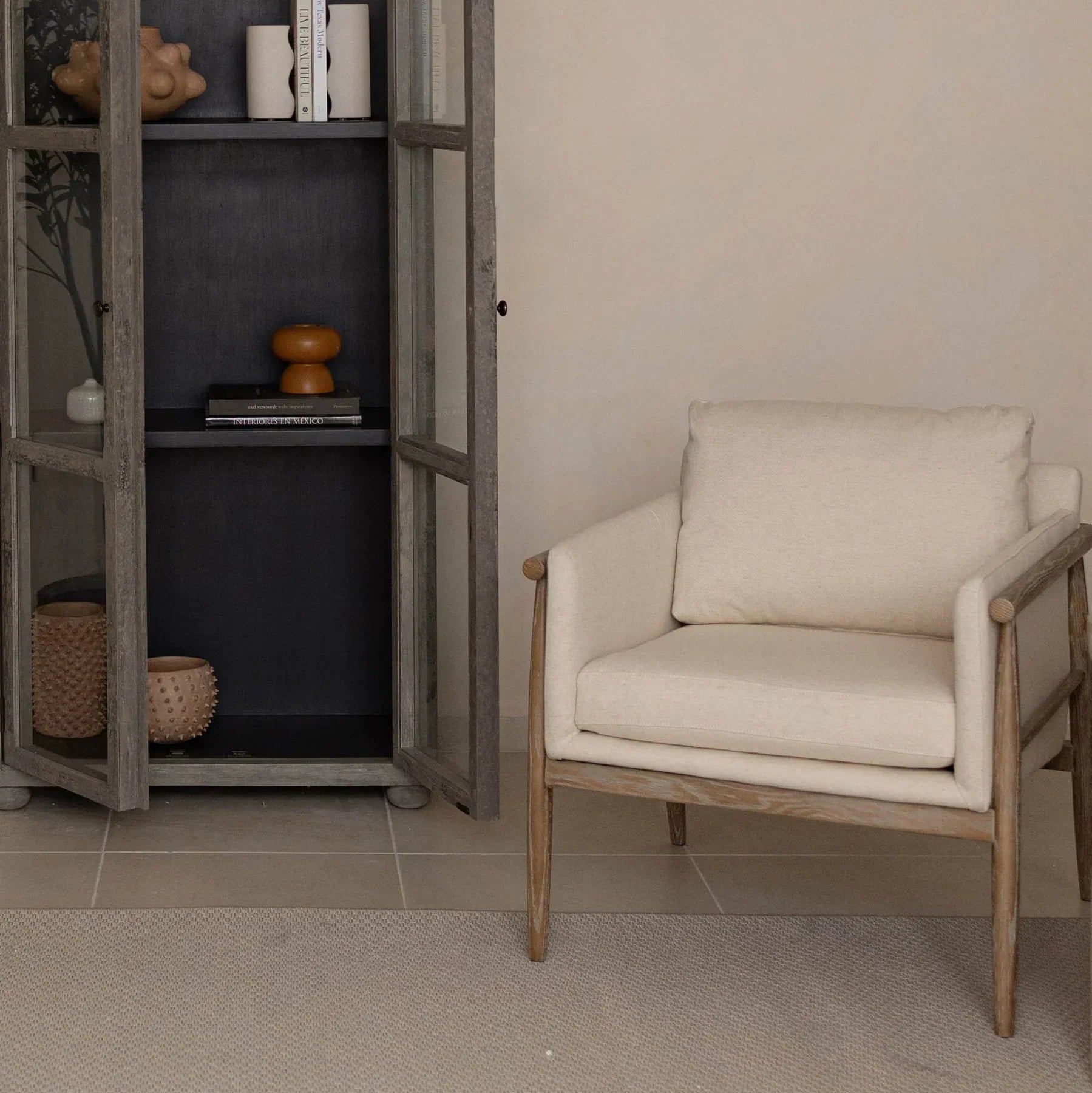 Bronte club chair with light beige fabric upholstery and wood frame front view