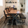 Lifestyle shot of the Brooklyn bench on hardwood floors paired with a matching wood dining set