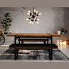 Clean studio-style lifestyle shot featuring the Brooklyn bench under a modern sputnik chandelier
