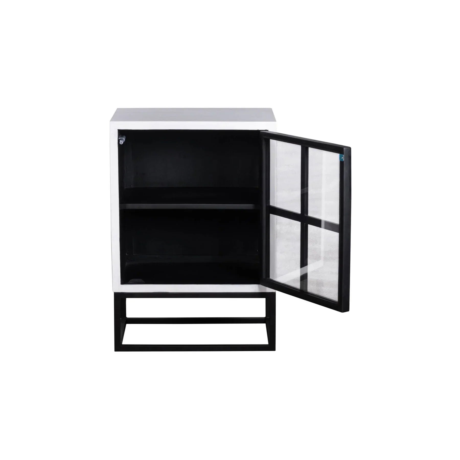 Three-quarter view of the Caged side table featuring a white-finished wooden body with a black-framed glass door and a minimalist metal box base