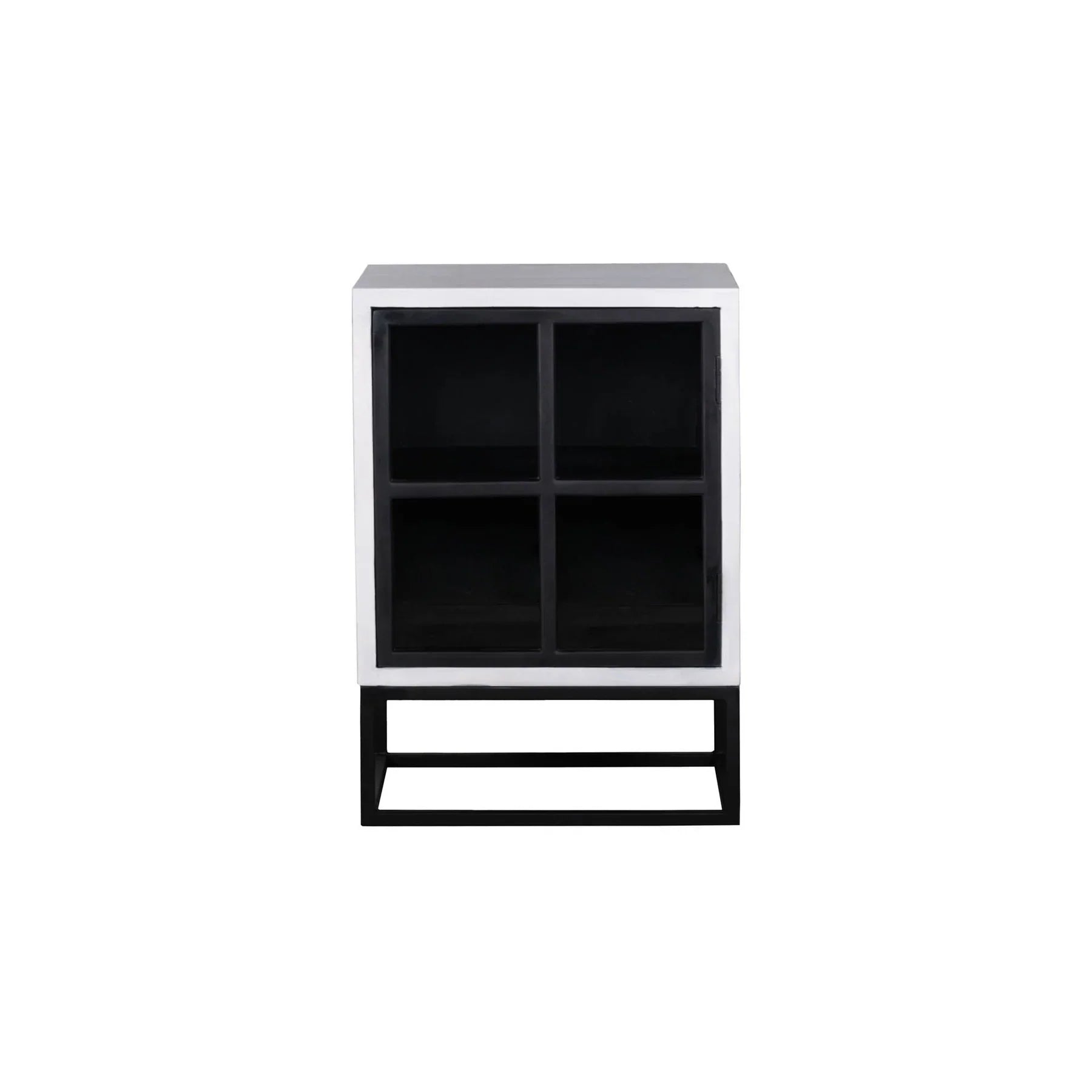 Three-quarter view of the Caged side table featuring a white-finished wooden body with a black-framed glass door and a minimalist metal box base