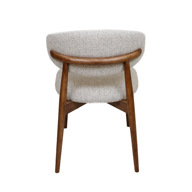 Cammy dining chair with beige textured fabric upholstery and walnut wood legs, front view on white background