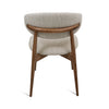Back view of Cammy dining chair with rounded beige textured fabric backrest and walnut wood support frame and legs