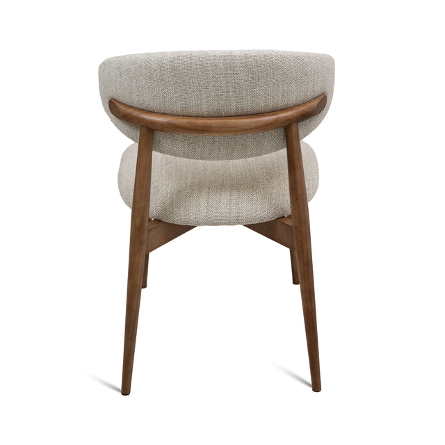 Cammy dining chair with beige textured fabric upholstery and walnut wood legs, front view on white background