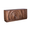 Three-quarter perspective view of the Caracol sideboard featuring a rich natural mango wood finish and a large hand-carved concentric circle design across four doors