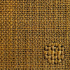 Macro shot of the caramel brown textured weave fabric for material reference