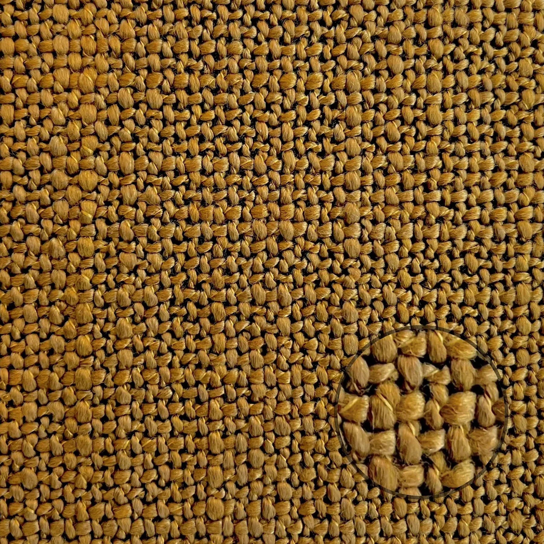 Macro shot of the caramel brown textured weave fabric for material reference