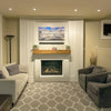 Pair of Carmen chairs styled in a warm living room featuring a fireplace and neutral area rug