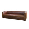 Angled 3/4 view of the camel brown Channel leather sofa