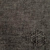 Full-frame macro shot of the charcoal grey textured weave upholstery for material reference