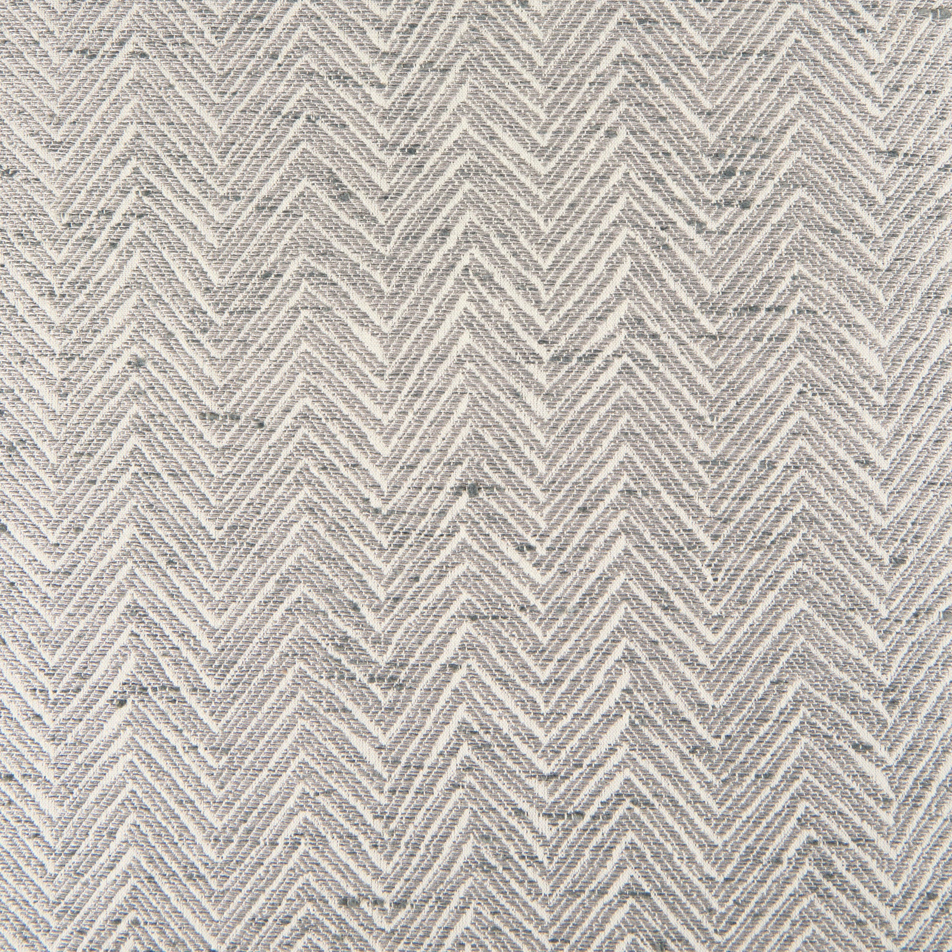 Front view of the Charlotte bench featuring light gray chevron-patterned upholstery and a minimalist black metal frame